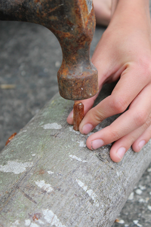 GI-16-Banging-in-dowel-300x450