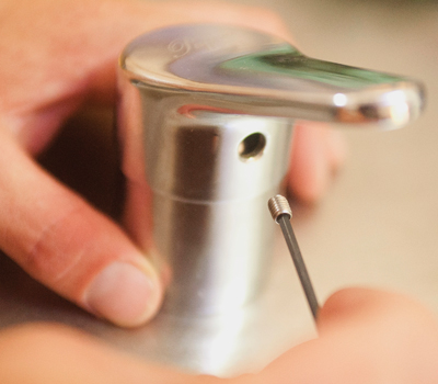 How-to-fix-your-leaky-tap-Step-5-Unfasten-the-mixer-400x350-GI04