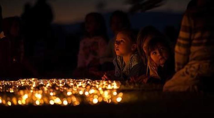 nz_tauranga_girl_and_candle_copyright_wwf_aaron_bryant_13371